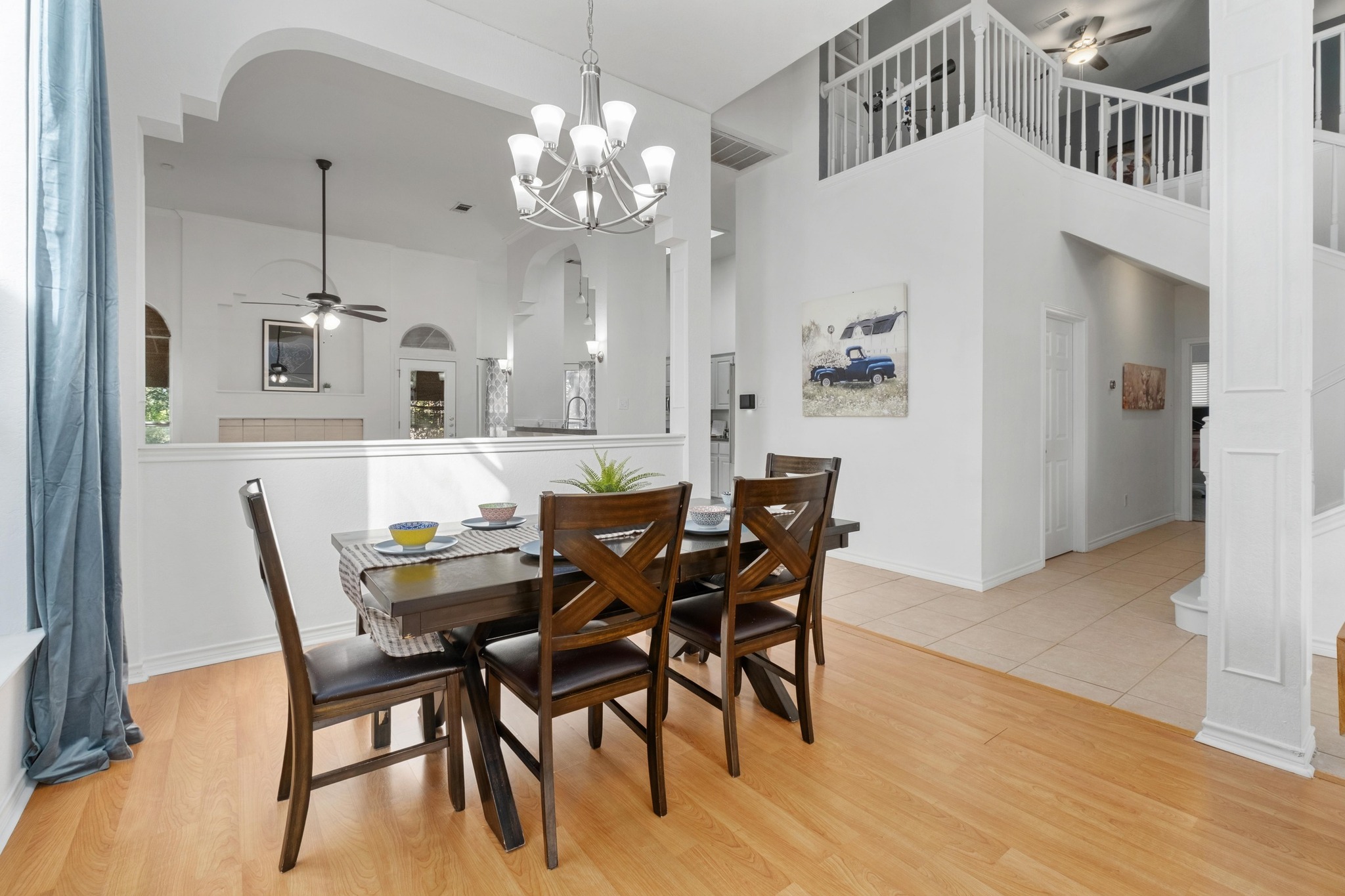 3808 Latimer Drive Austin, TX 78732 - Photo 14 of 30 a view of a dining room with furniture and chandelier