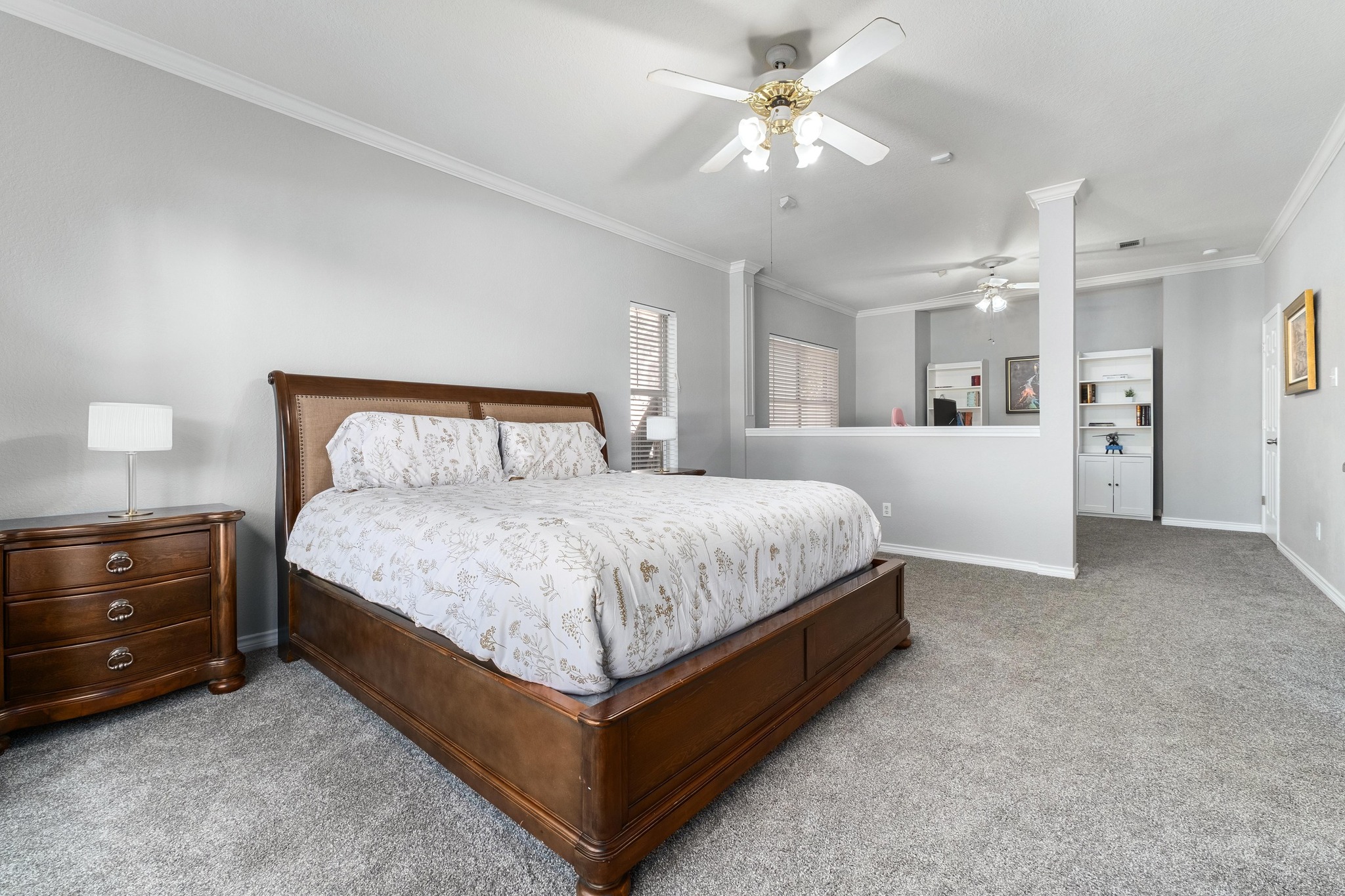 3808 Latimer Drive Austin, TX 78732 - Photo 16 of 30 a bedroom with a bed and a chandelier