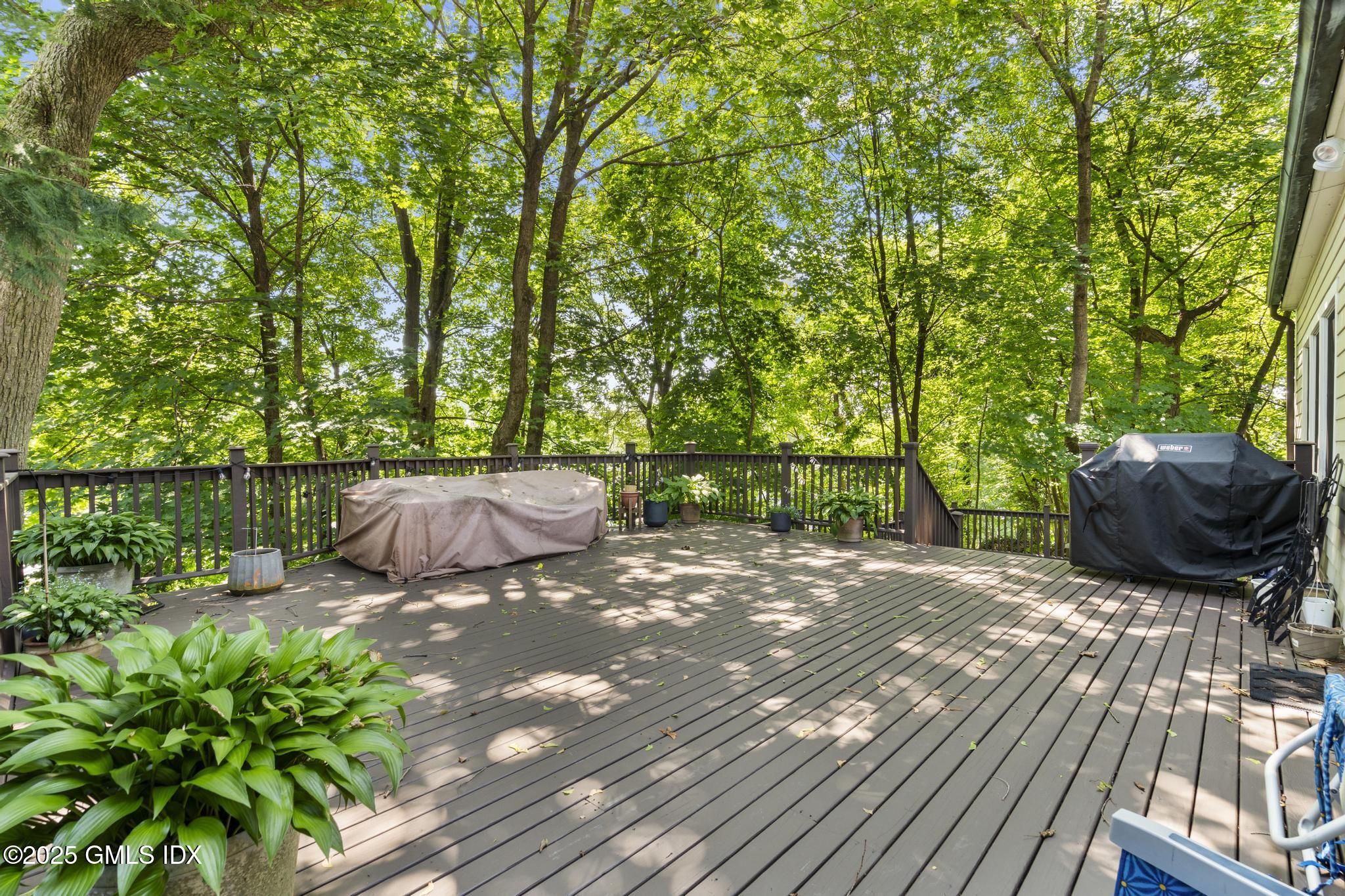 15 Ridge Road Cos Cob, CT 06807 - Photo 14 of 15 a view of a backyard with sitting area