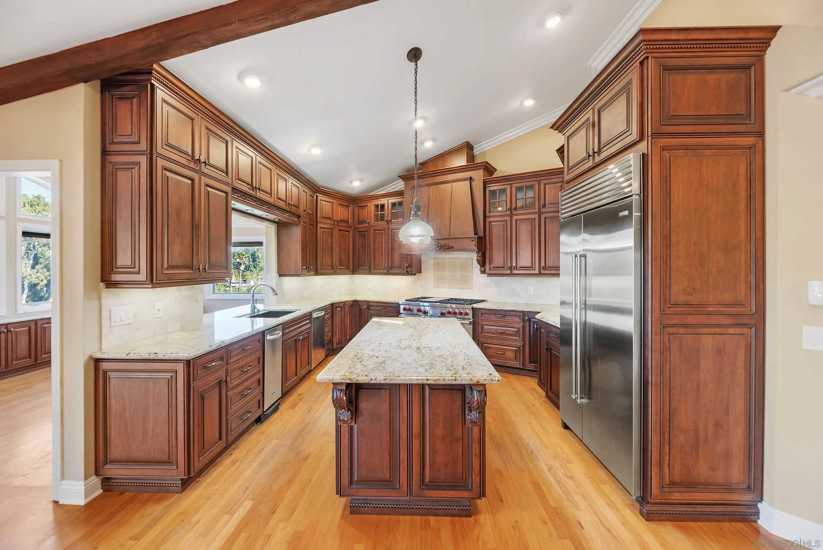 15641 Boulder Mountain Road Poway, CA 92064 - Photo 5 of 75 a kitchen with stainless steel appliances granite countertop a sink a stove and a refrigerator