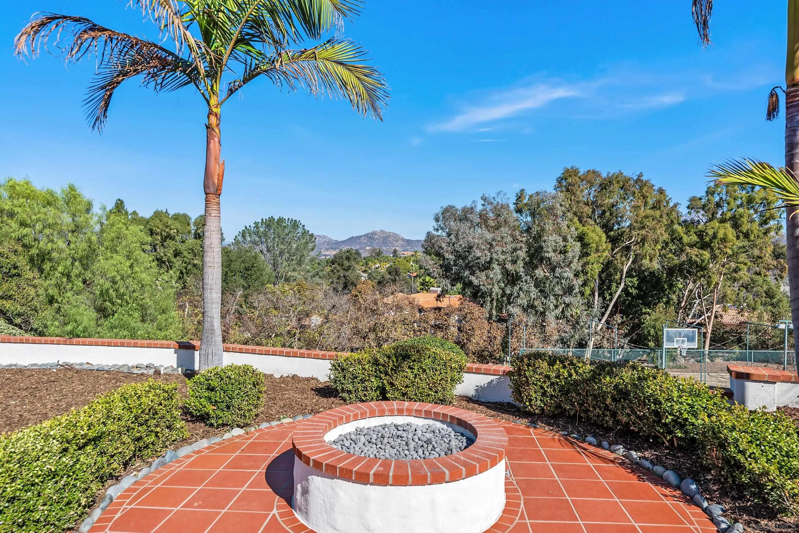 15641 Boulder Mountain Road Poway, CA 92064 - Photo 53 of 75 a view of a street with a tree