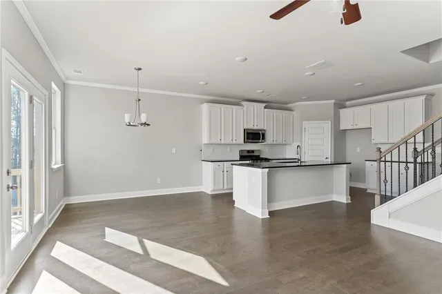 a large kitchen with cabinets