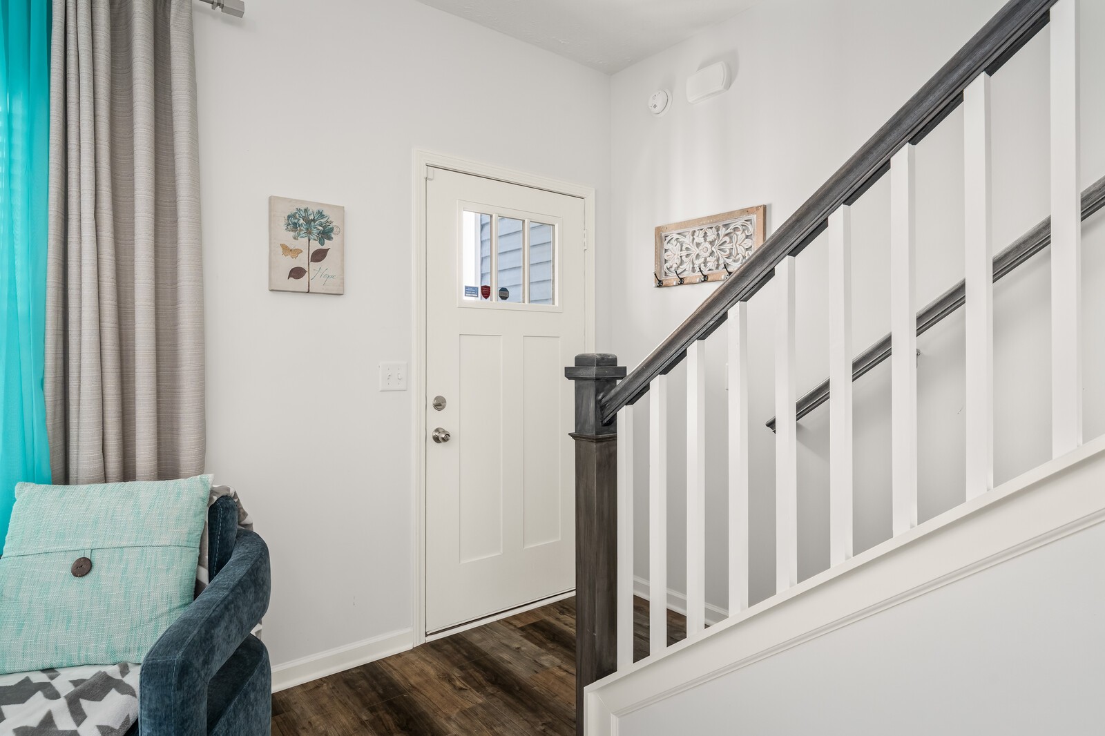 1932 Secretariat Trace Murfreesboro, TN 37128 - Photo 11 of 51 a view of a hallway with wooden floor and stairs