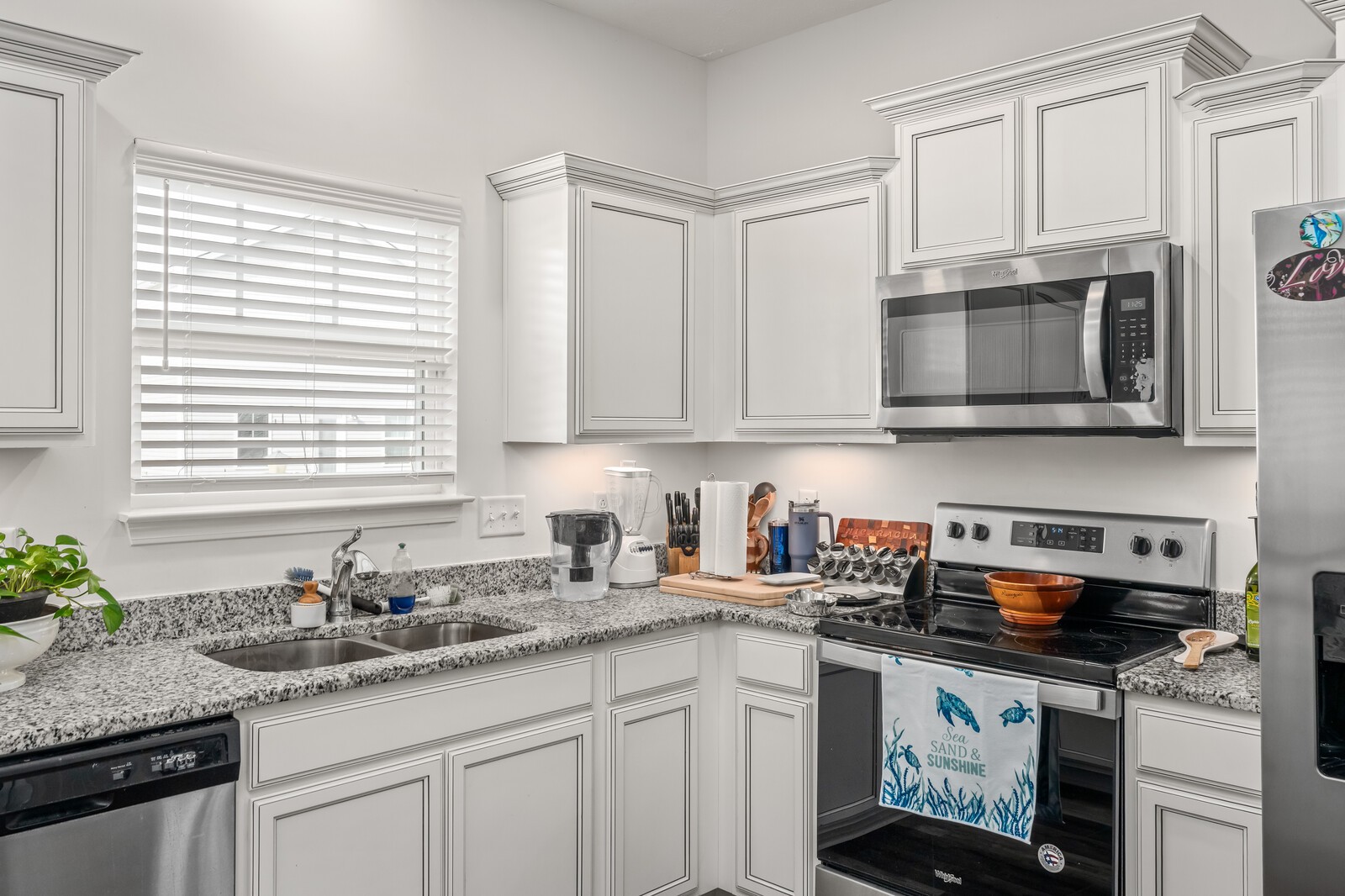 1932 Secretariat Trace Murfreesboro, TN 37128 - Photo 19 of 51 a kitchen with stainless steel appliances granite countertop white cabinets a window and a sink