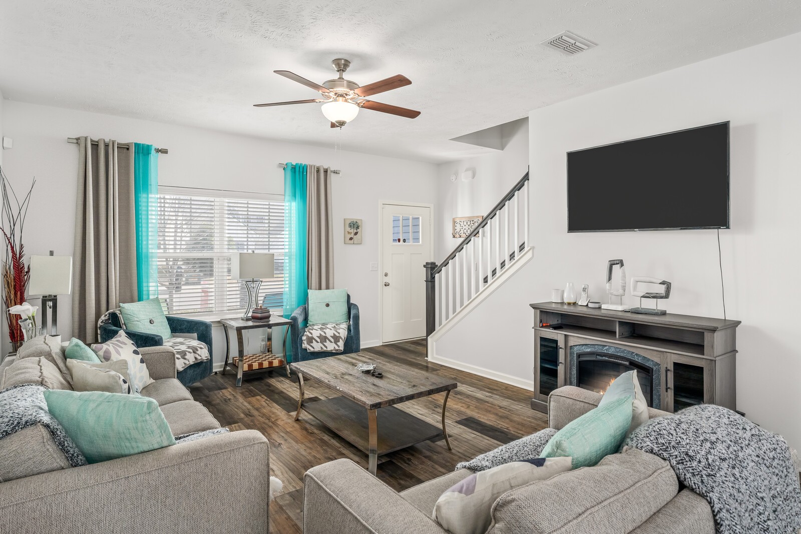 1932 Secretariat Trace Murfreesboro, TN 37128 - Photo 2 of 51 a living room with furniture and a flat screen tv