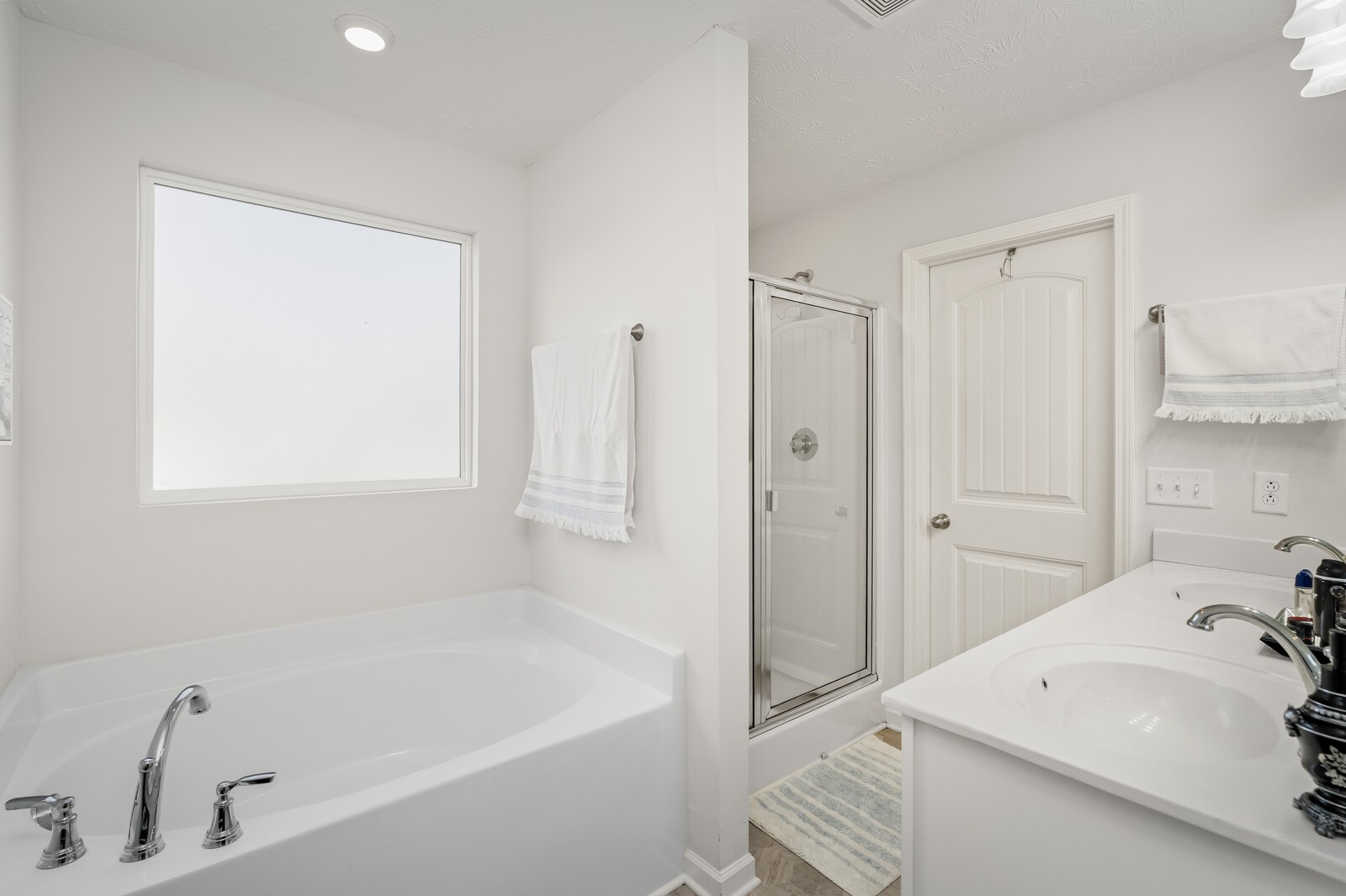 1932 Secretariat Trace Murfreesboro, TN 37128 - Photo 26 of 51 a bathroom with a bathtub and a sink