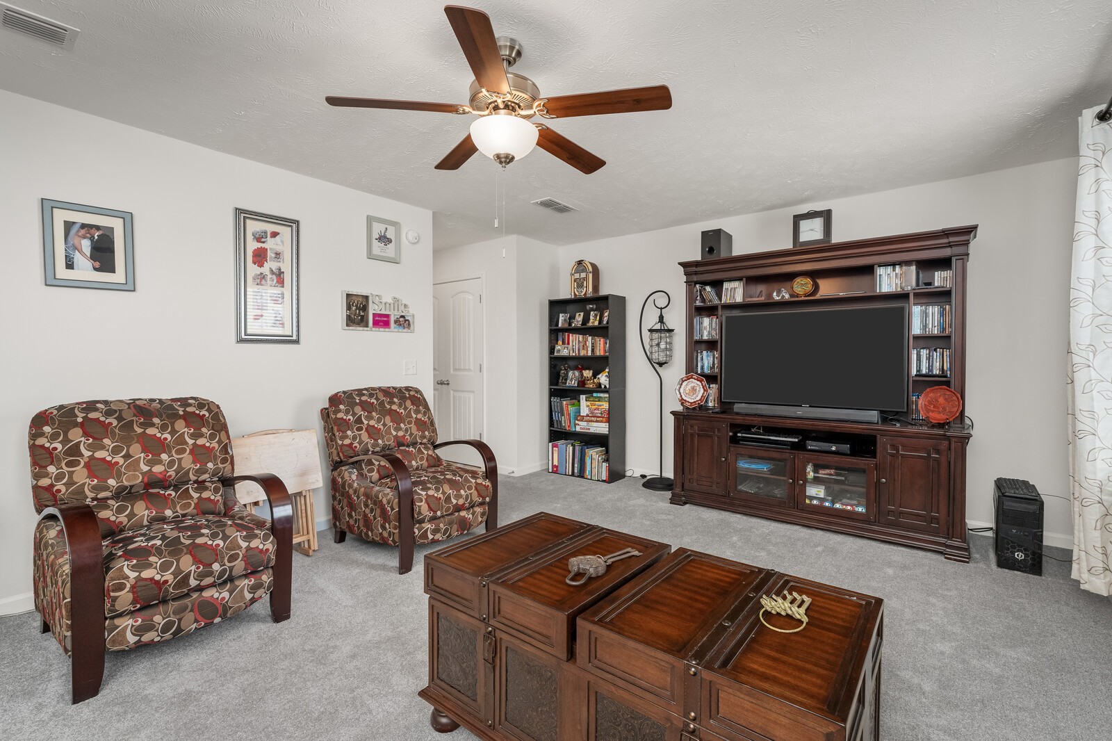 1932 Secretariat Trace Murfreesboro, TN 37128 - Photo 33 of 51 a living room with furniture and a flat screen tv