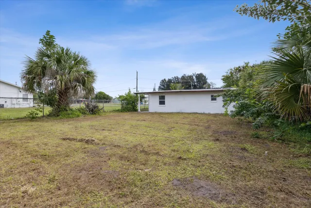 a view of a yard with an outdoor space