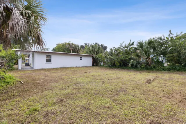 a view of a backyard of a house
