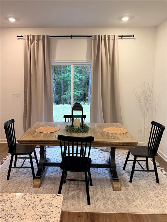 117 Red Maple Way Adairsville, GA 30103 - Photo 14 of 44 a view of a dining room with furniture window and outside view