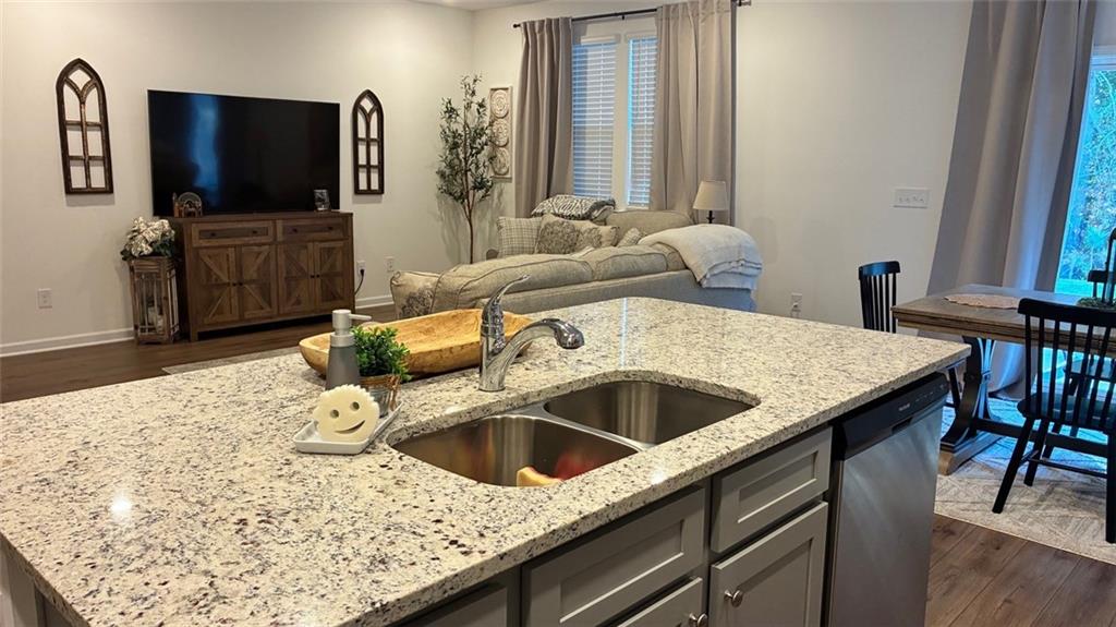 117 Red Maple Way Adairsville, GA 30103 - Photo 20 of 44 a kitchen with a stove and a sink