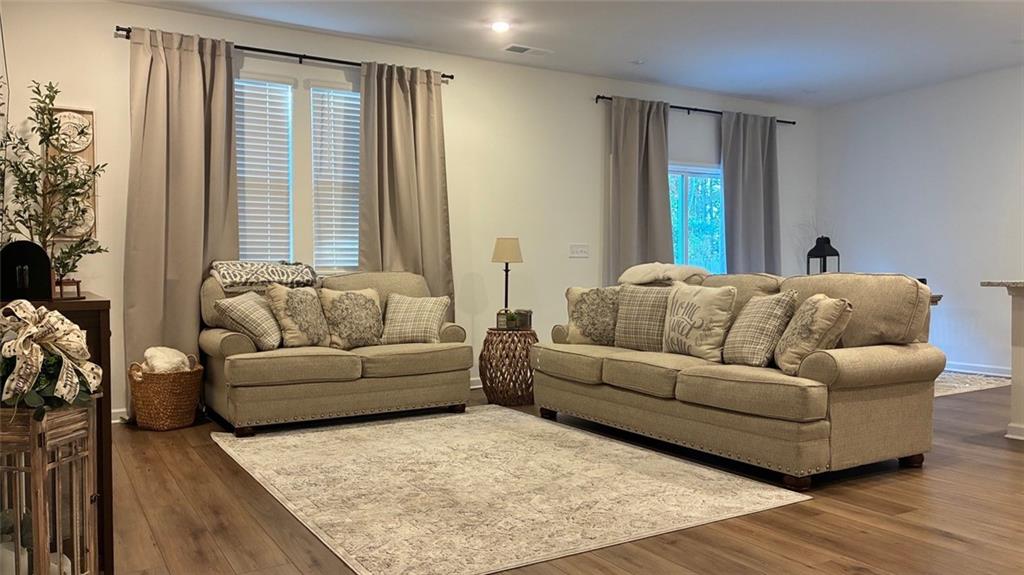 117 Red Maple Way Adairsville, GA 30103 - Photo 2 of 44 a living room with furniture and a large window