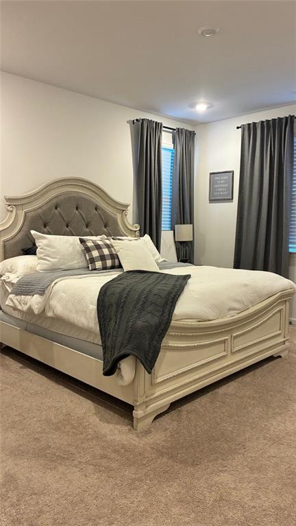 117 Red Maple Way Adairsville, GA 30103 - Photo 27 of 44 a bedroom with bed and window