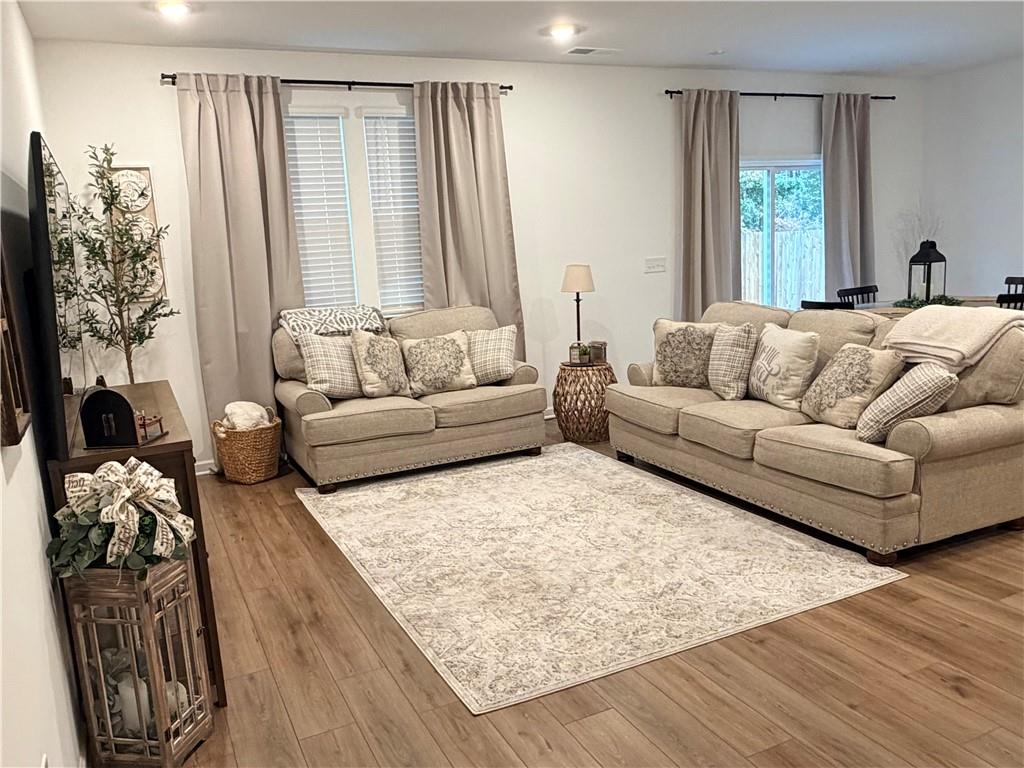117 Red Maple Way Adairsville, GA 30103 - Photo 8 of 44 a living room with furniture and a large window