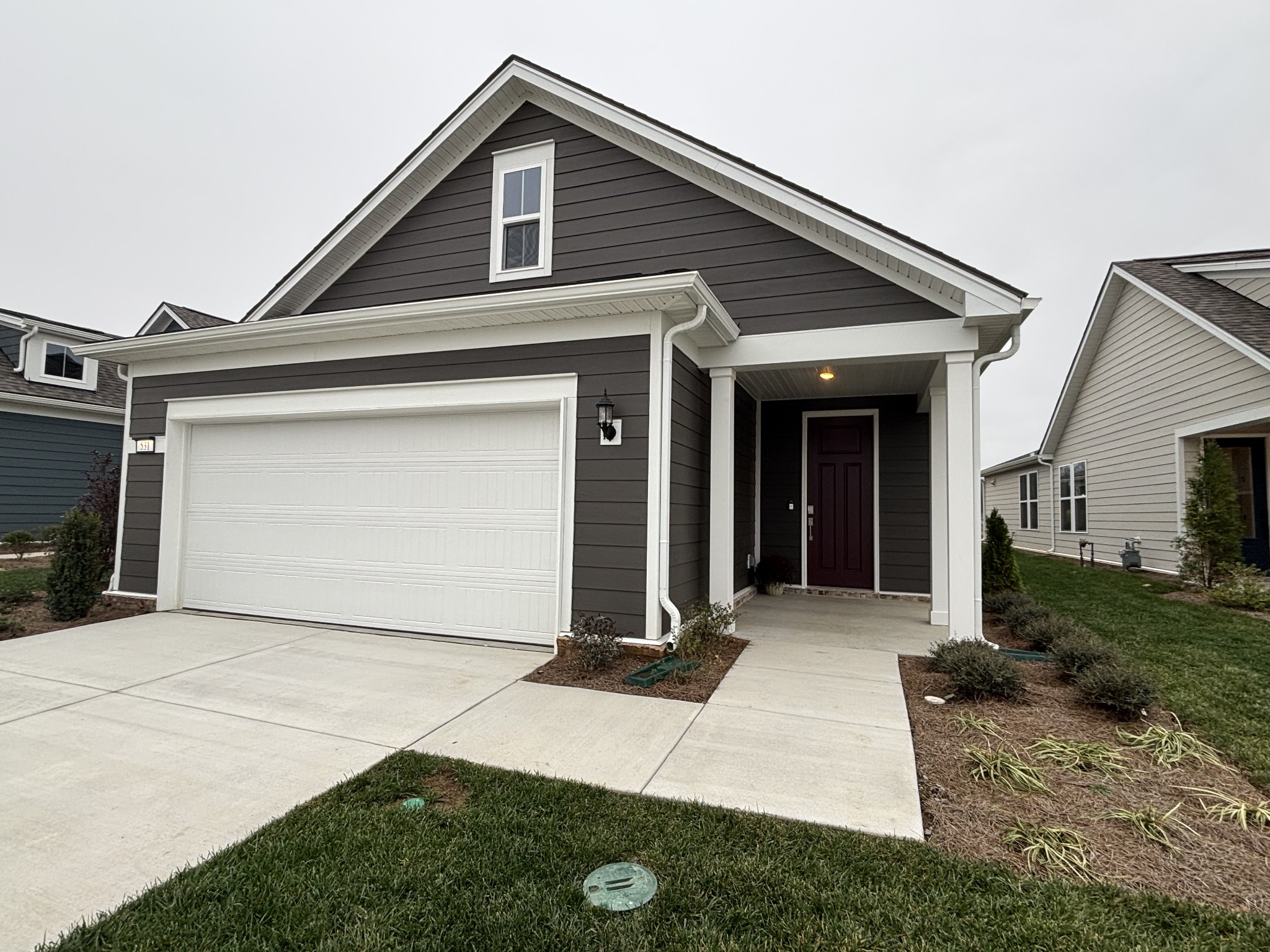 531 Scarlet Oak Road Lebanon, TN 37090 - Photo 2 of 42 a front view of a house with a yard