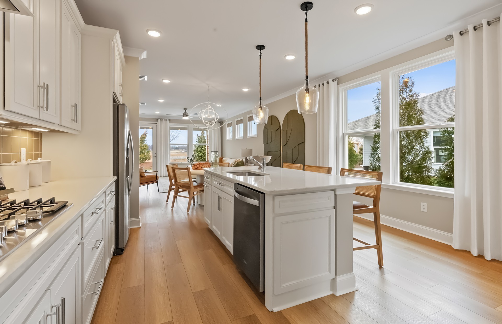 531 Scarlet Oak Road Lebanon, TN 37090 - Photo 34 of 42 a kitchen with kitchen island a counter top space a sink stainless steel appliances and cabinets