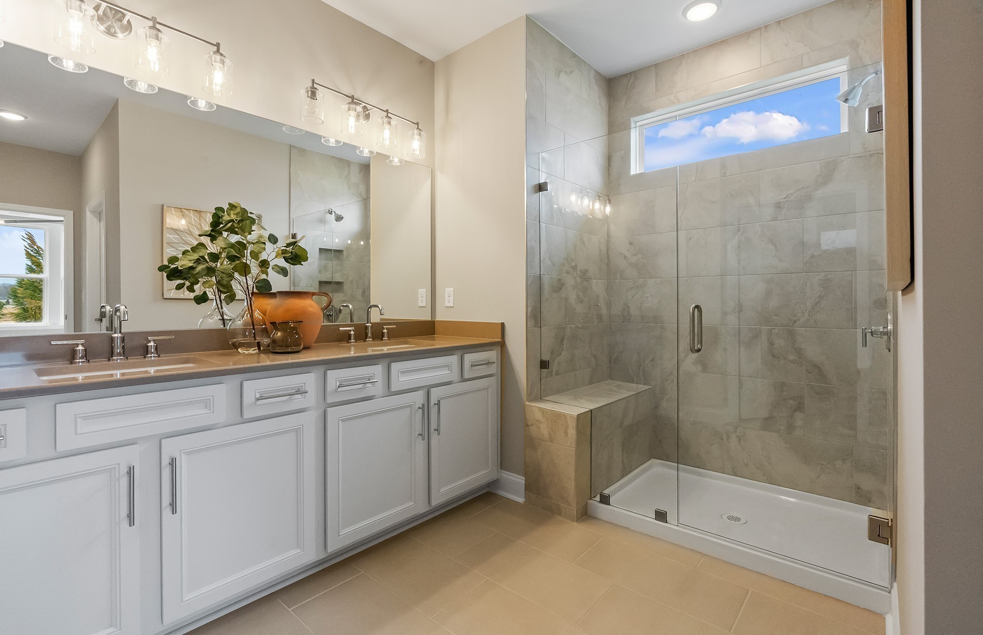 531 Scarlet Oak Road Lebanon, TN 37090 - Photo 39 of 42 a bathroom with a shower sink and mirror