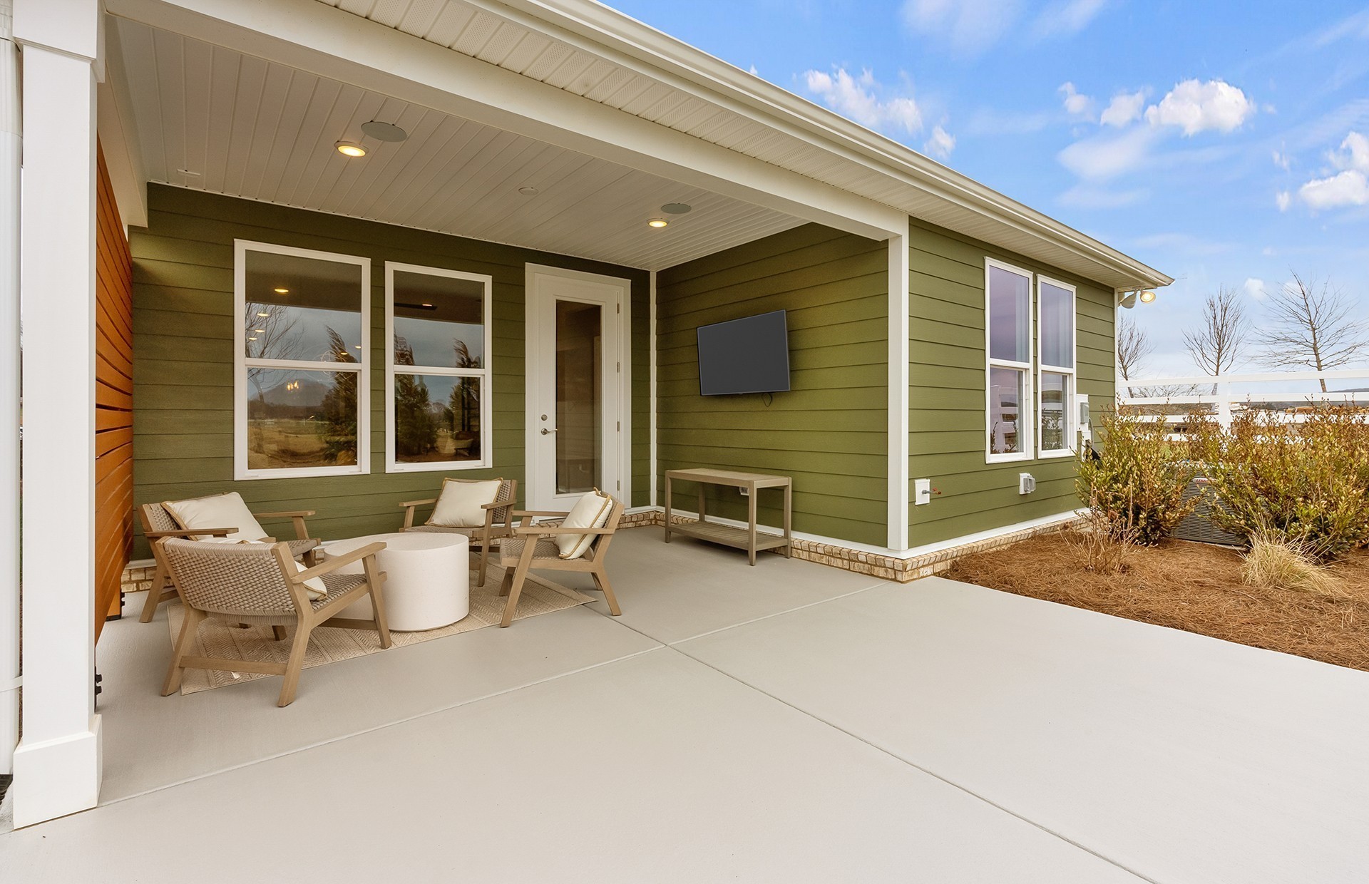 531 Scarlet Oak Road Lebanon, TN 37090 - Photo 42 of 42 a view of a patio with table and chairs and wooden floor