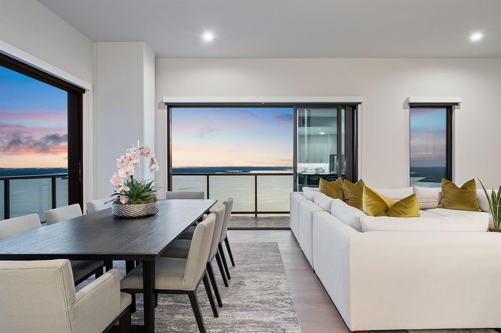 3111 Sunset Boulevard, Unit 1600 Flower Mound, TX 75022 - Photo 11 of 36 a living room with furniture and a flat screen tv