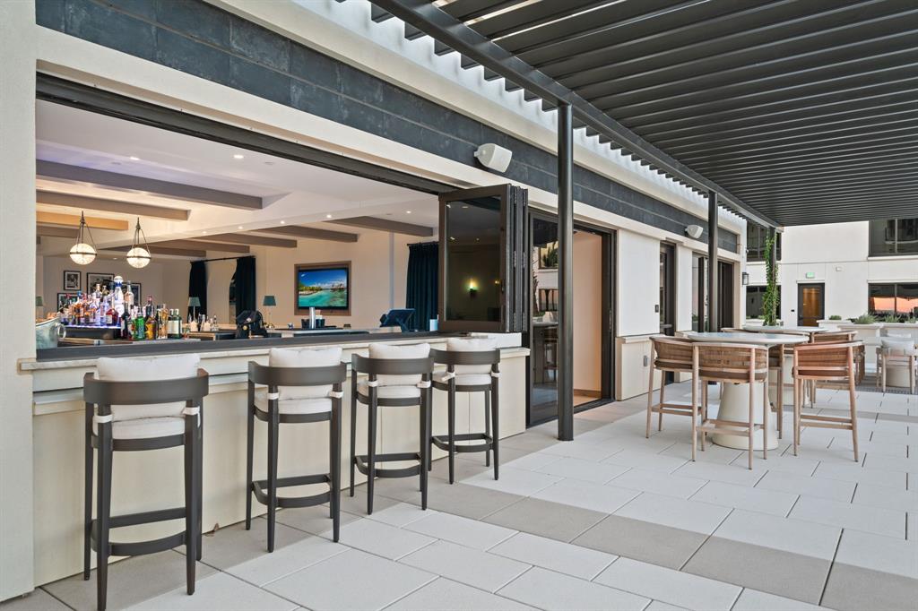 3111 Sunset Boulevard, Unit 1600 Flower Mound, TX 75022 - Photo 33 of 36 a view of a dining room with furniture