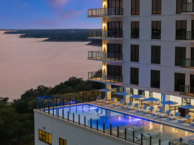 a view of a lake with a building in front of it