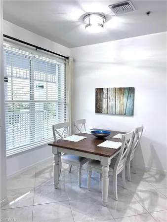 a view of a workspace with furniture