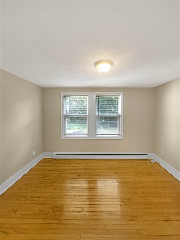 109 Hampshire Road, Unit 2 Methuen, MA 01844 - Photo 22 of 29 a view of an empty room with a window
