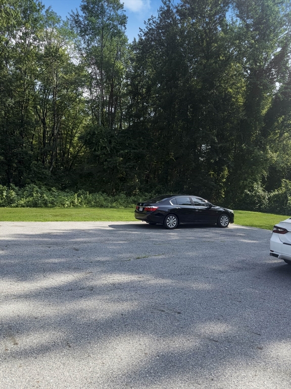 109 Hampshire Road, Unit 2 Methuen, MA 01844 - Photo 25 of 29 a car parked on the side of the road