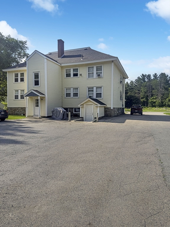 109 Hampshire Road, Unit 2 Methuen, MA 01844 - Photo 26 of 29 a view of a house with a patio