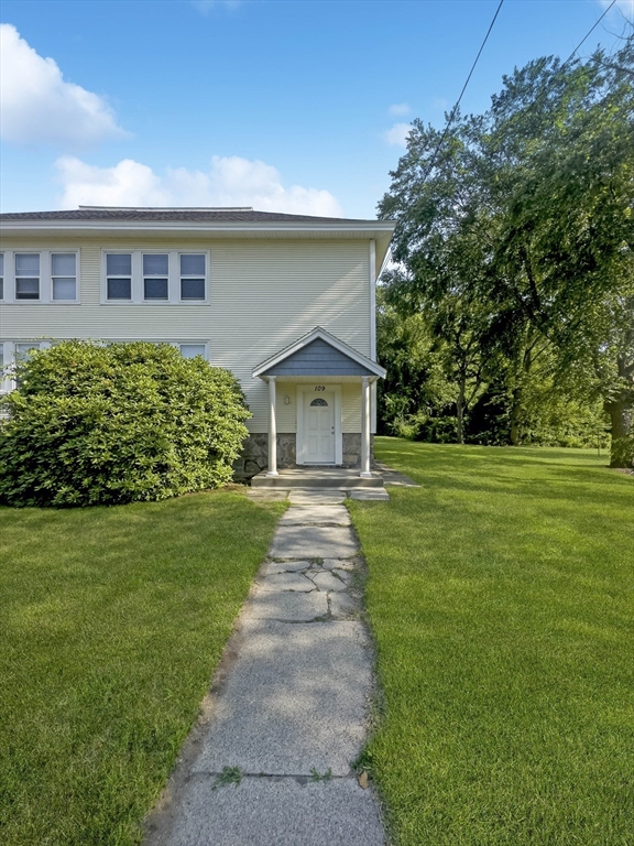 109 Hampshire Road, Unit 2 Methuen, MA 01844 - Photo 29 of 29 a front view of house with yard and green space
