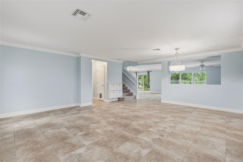 25134 Palisade Road Punta Gorda, FL 33983 - Photo 9 of 58 a view of an empty room with a window