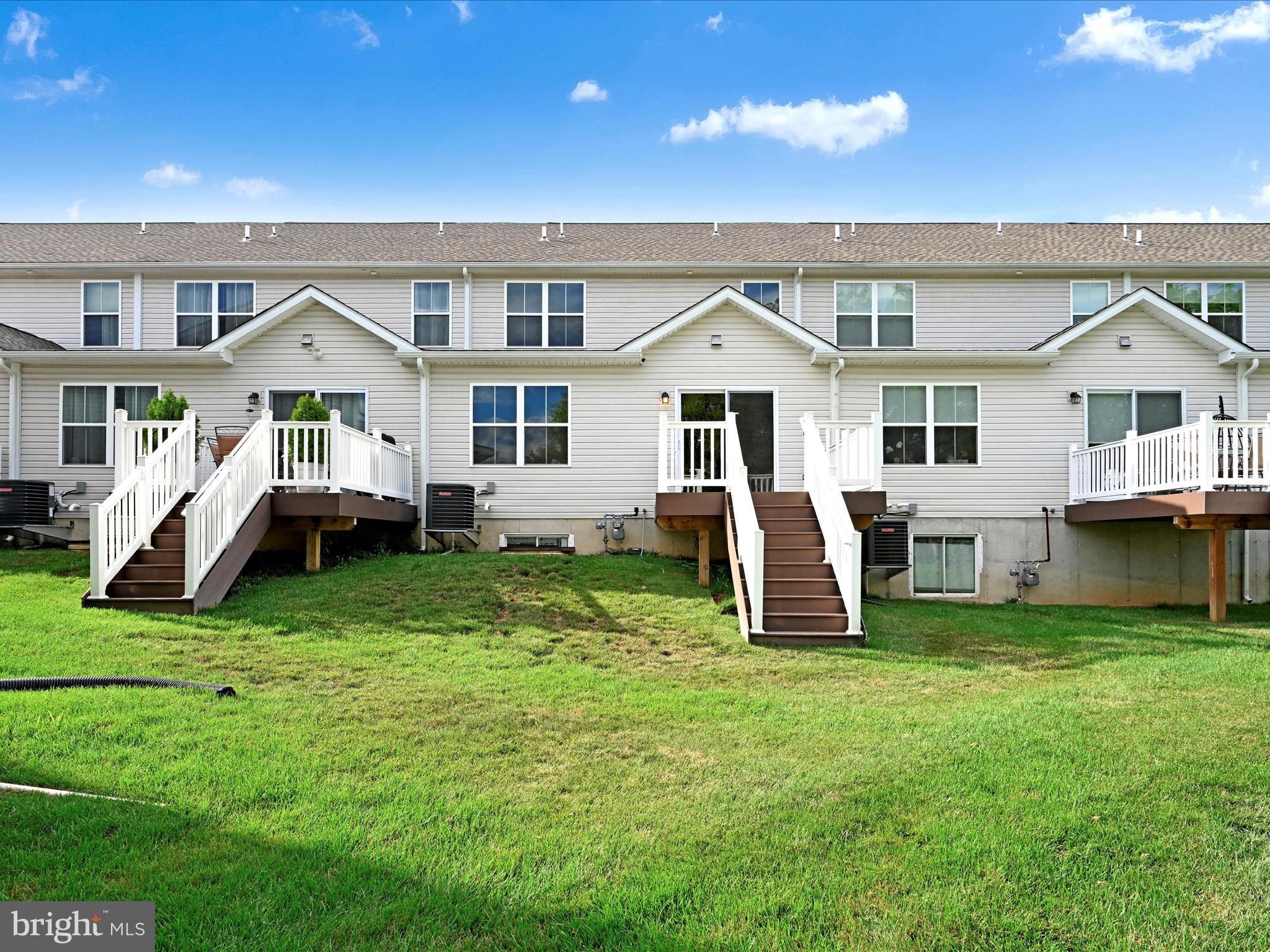 108 Staplehill Court Sinking Spring, PA 19608 - Photo 32 of 33 a front view of house with a garden and trees
