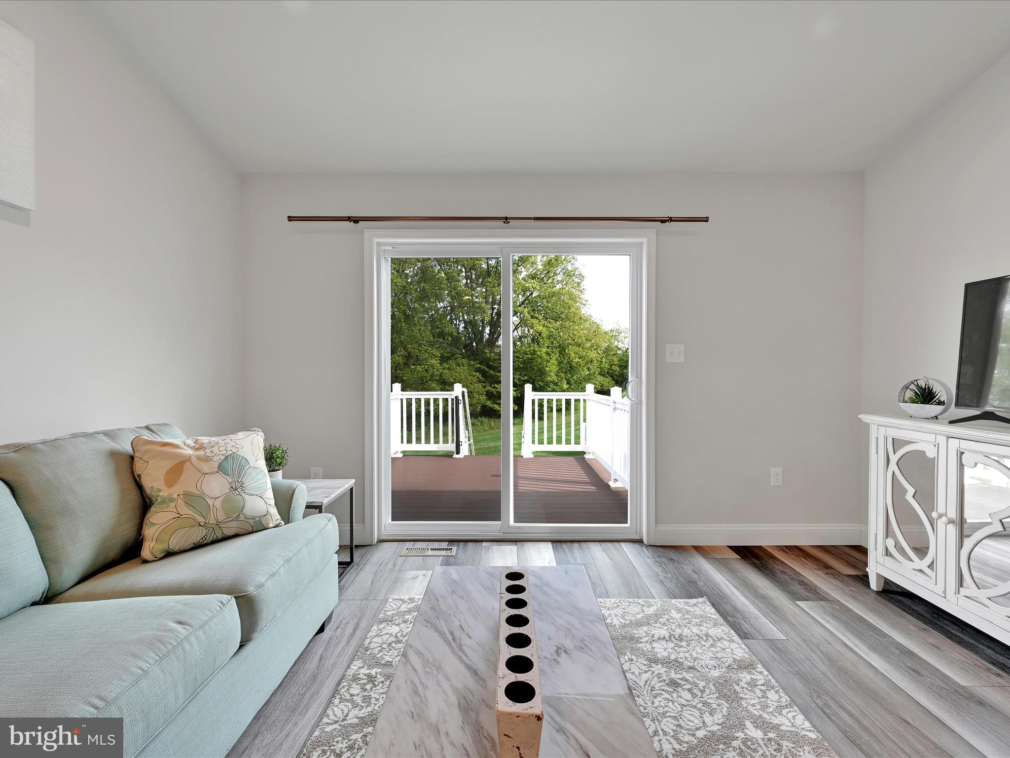 108 Staplehill Court Sinking Spring, PA 19608 - Photo 7 of 33 a living room with furniture and a rug
