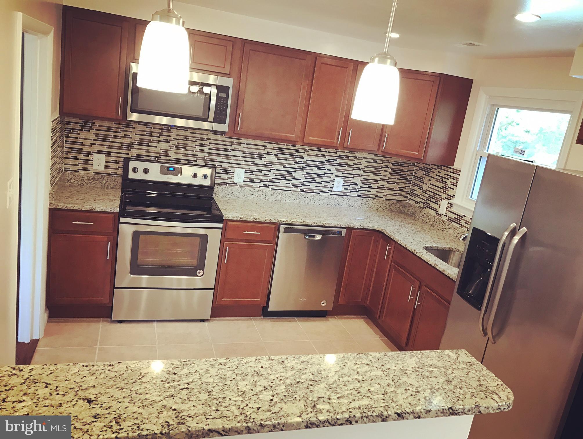 5702 Huntland Road Temple Hills, MD 20748 - Photo 6 of 27 Kitchen