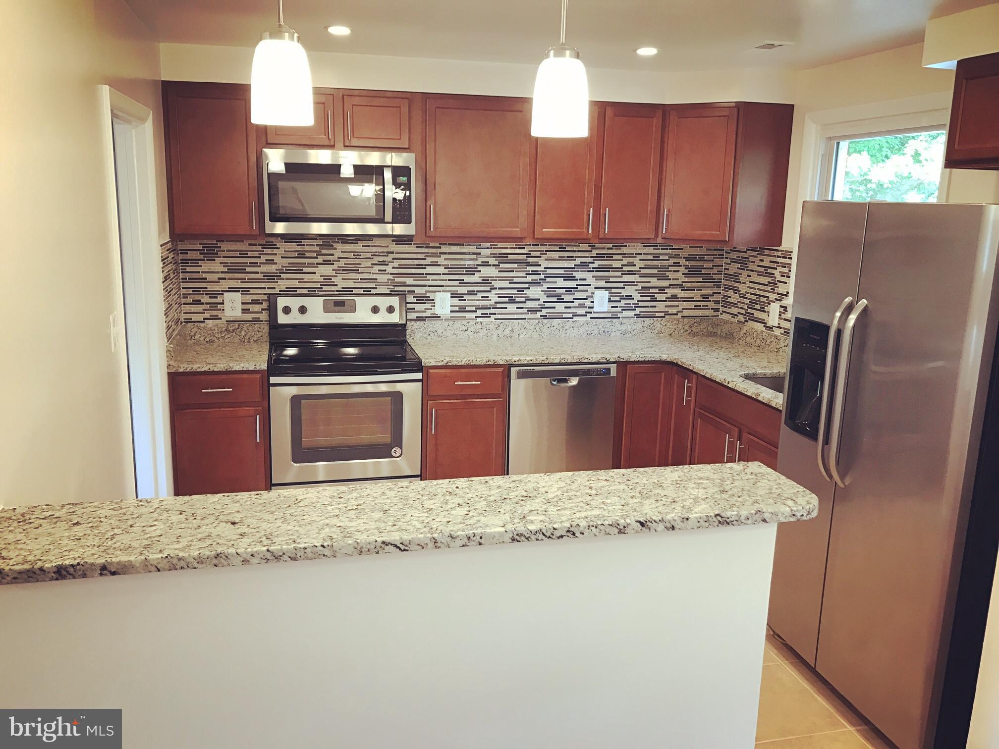 5702 Huntland Road Temple Hills, MD 20748 - Photo 7 of 27 Kitchen