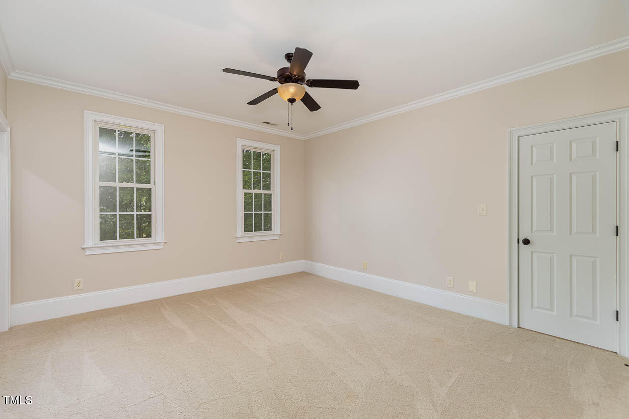 1097 Tacketts Pond Drive Raleigh, NC 27614 - Photo 28 of 38 a view of empty room with windows