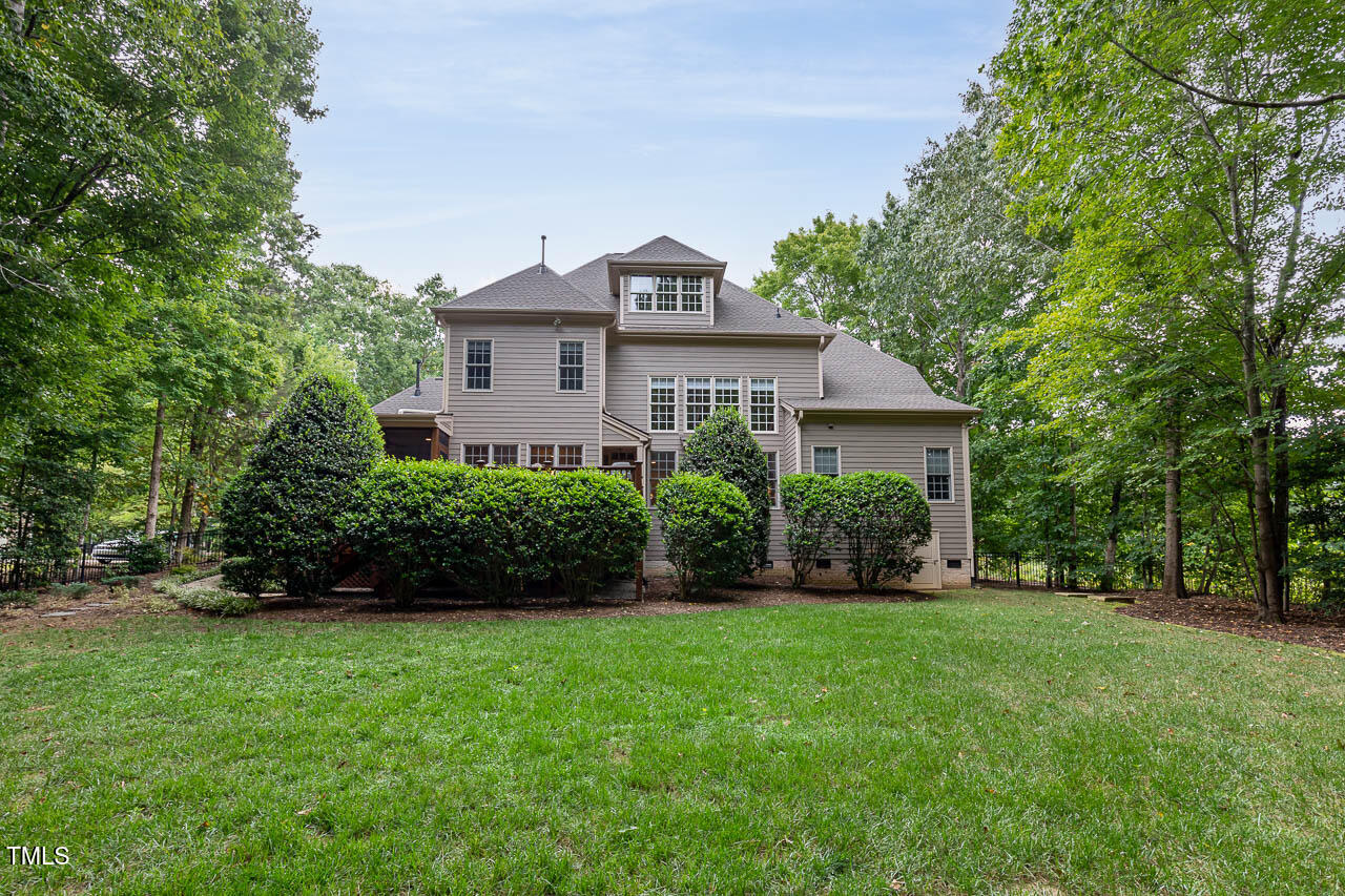 1097 Tacketts Pond Drive Raleigh, NC 27614 - Photo 36 of 38 a front view of a house with a yard