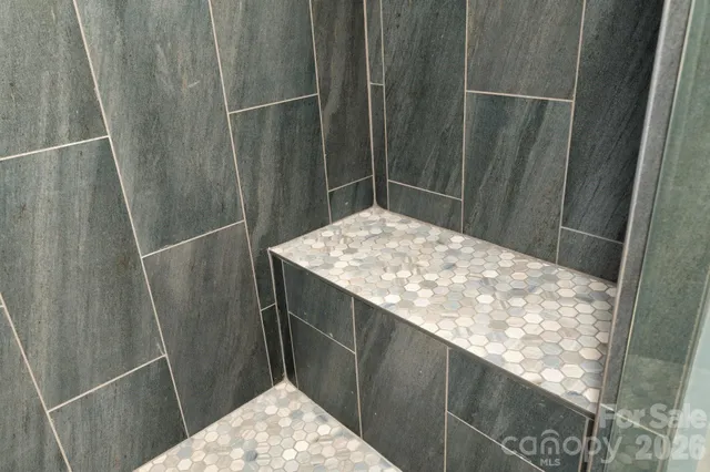 a view of a backyard with sitting area