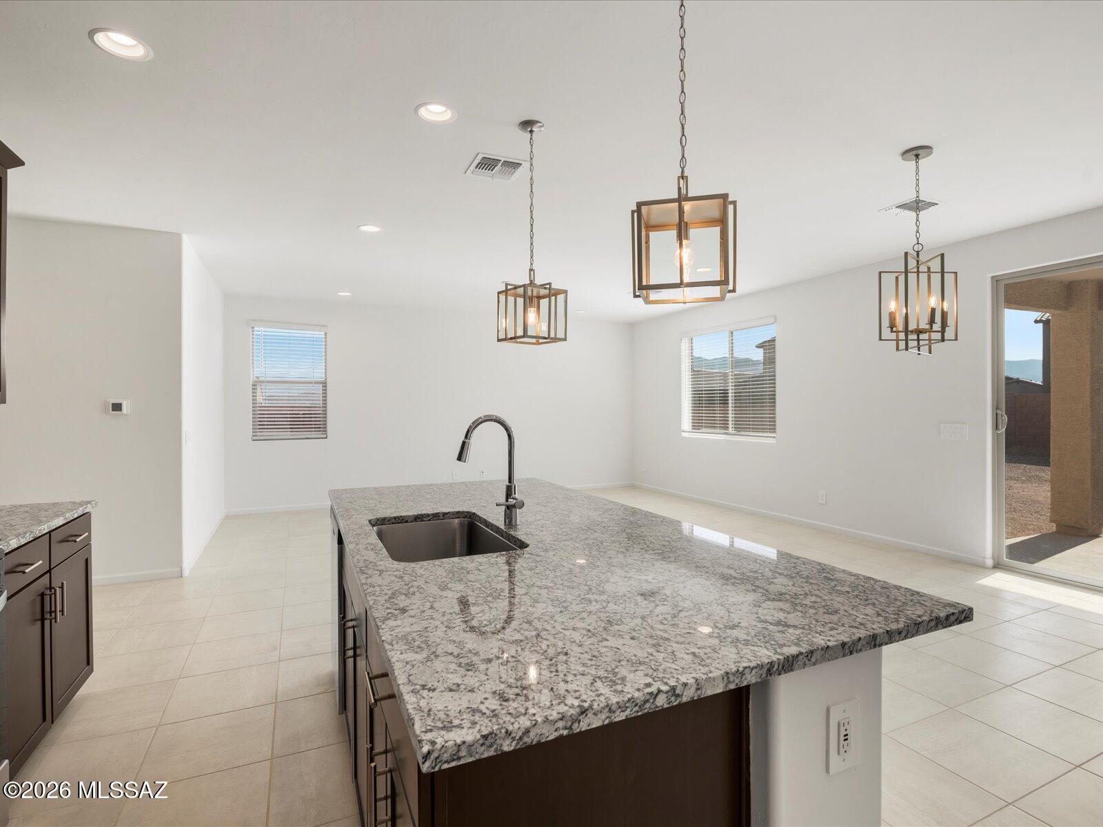 5160 West Bowen House Road Tucson, AZ 85757 - Photo 4 of 15 Photo is not of the actual home, but is an inspirational photo of builder’s model home and may depict options, furnishings, and/or decorator features that are not included
