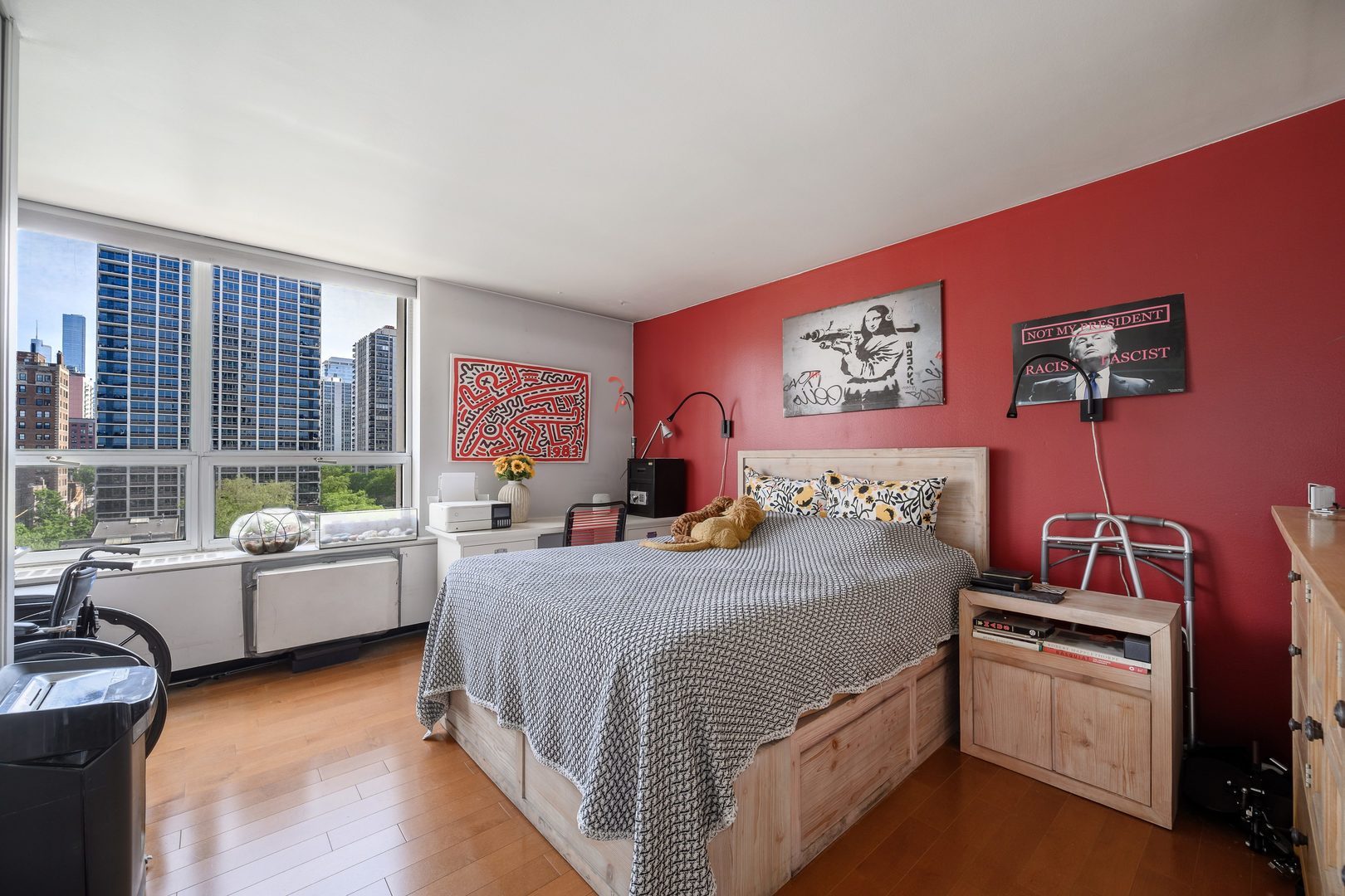 70 West Burton Place, Unit 705 Chicago, IL 60610 - Photo 12 of 17 a bedroom with bed and a couch