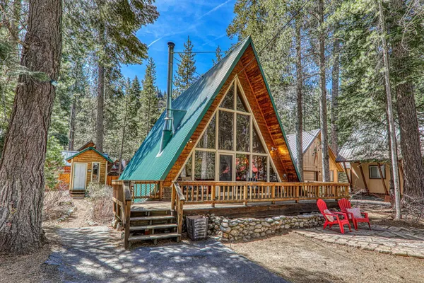 a view of a small house in the back yard