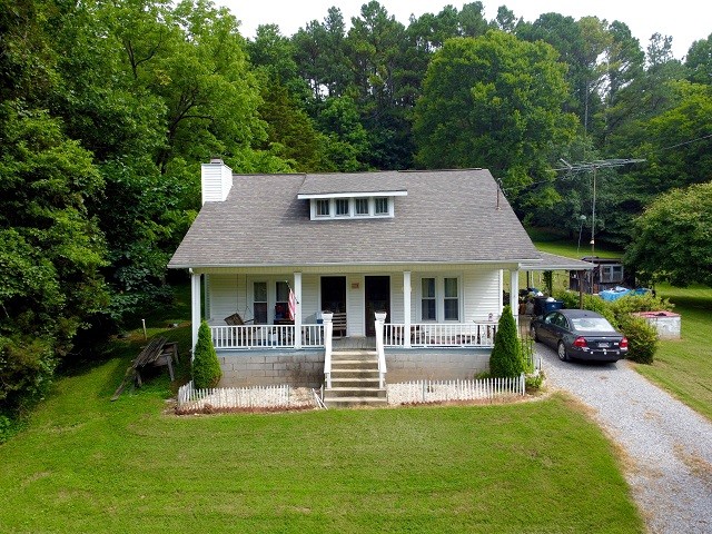 301 Red Tuttle Road Bethpage, TN 37022 - Photo 1 of 9 a view of house with a yard