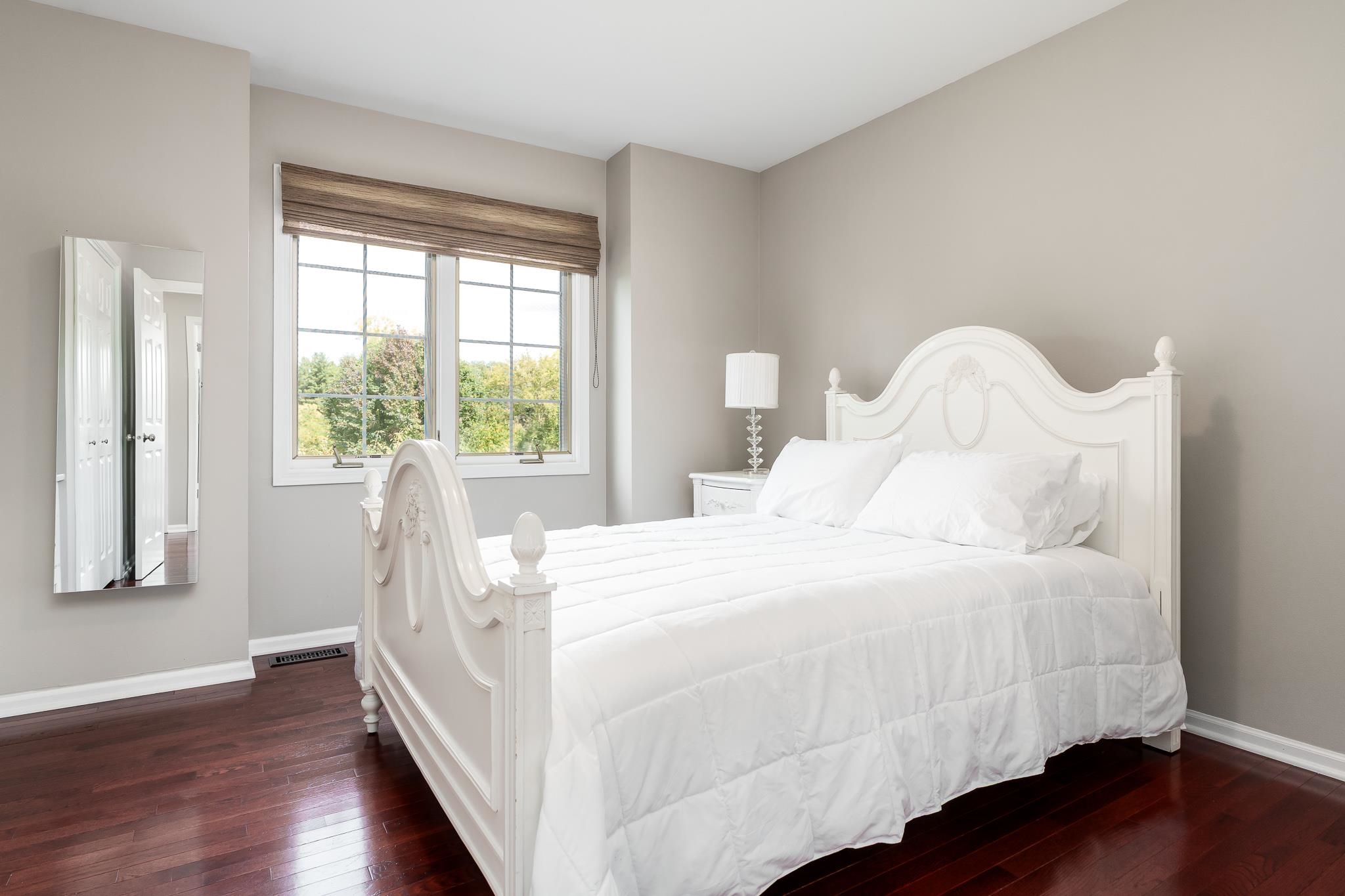 8551 Rote Road Rockford, IL 61107 - Photo 53 of 92 a bedroom with a bed and a window