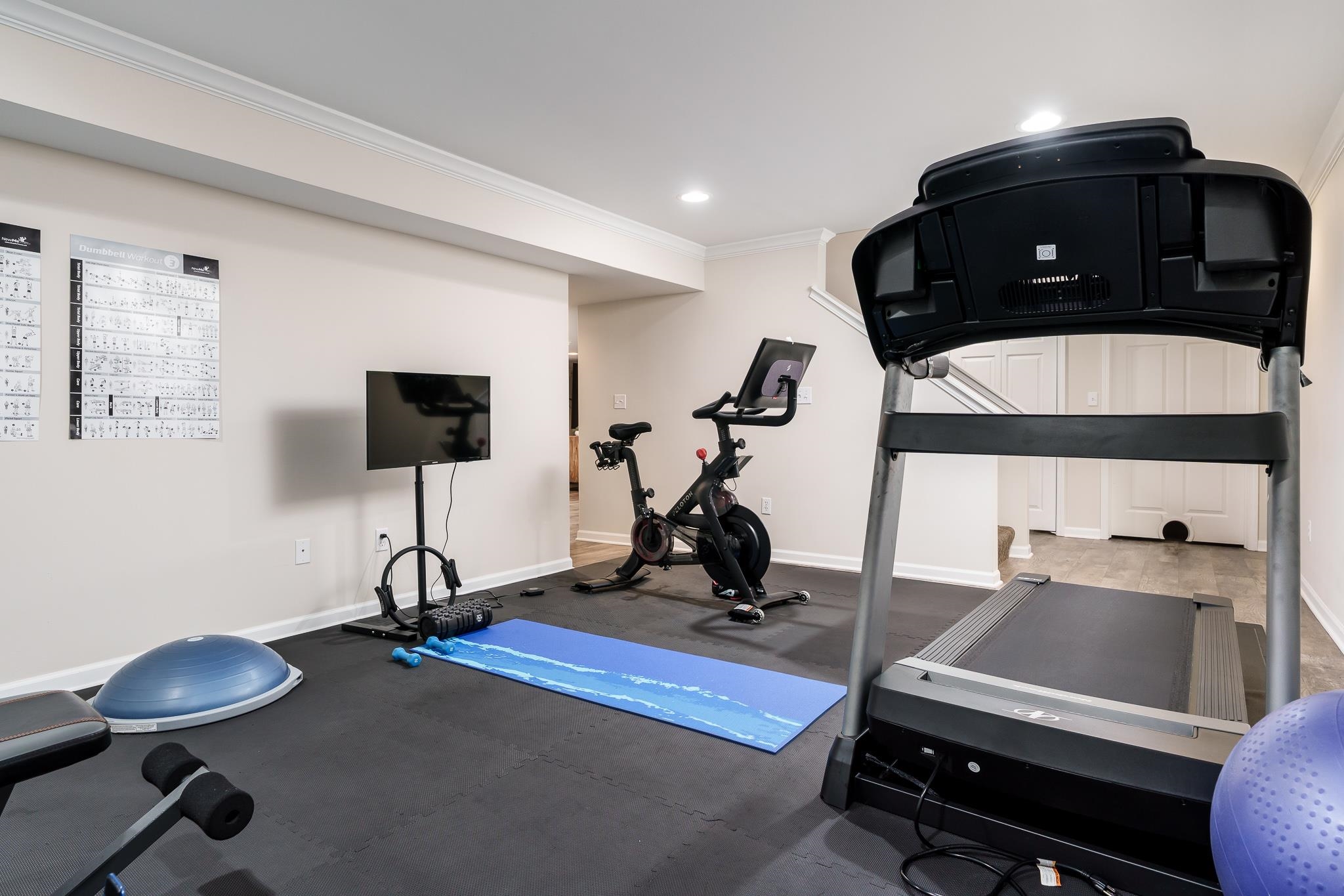 8551 Rote Road Rockford, IL 61107 - Photo 65 of 92 a room with gym equipment and a table