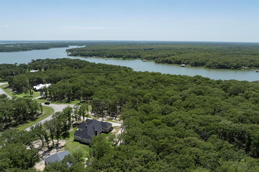 Lot 71 Anchor Quinlan, TX 75474 - Photo 12 of 18 a view of a lake with beach and mountain view