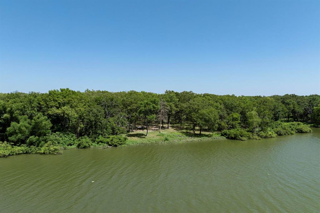 Lot 71 Anchor Quinlan, TX 75474 - Photo 6 of 18 a view of lake and trees