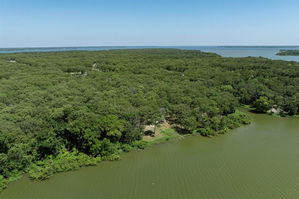 Lot 71 Anchor Quinlan, TX 75474 - Photo 7 of 18 a view of a field with an ocean