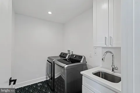 a view of a room with a fan and a window