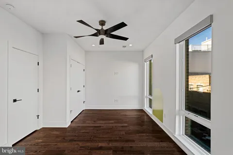 a bathroom with a toilet sink and shower