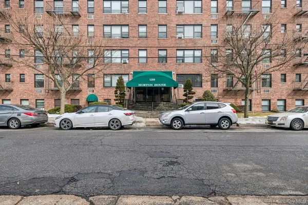 a car parked in front of a building